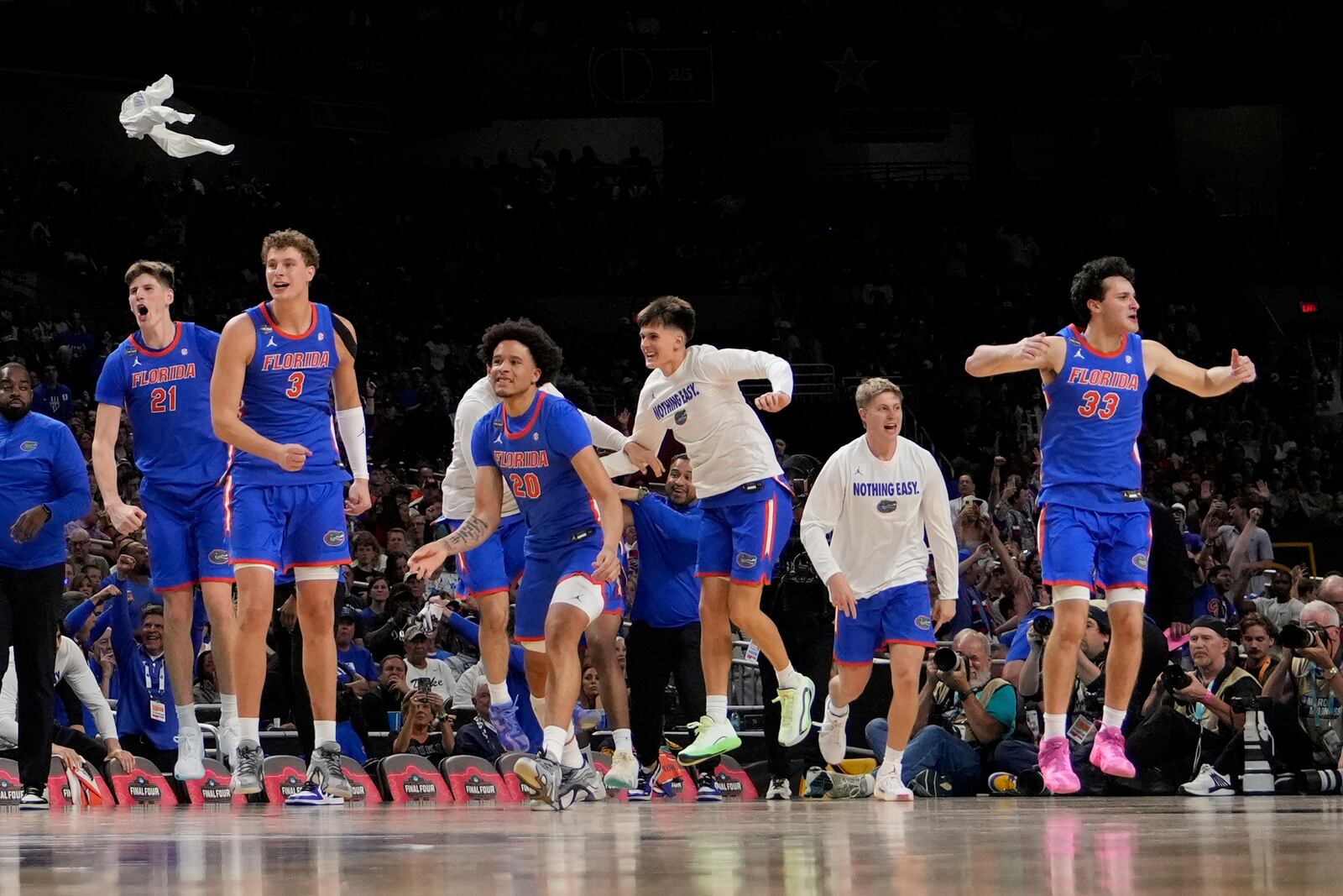 Florida celebrates their win against Auburn in the national semifinals at the Final Four of the NCAA college basketball tournament, Saturday, April 5, 2025, in San Antonio. (AP Photo/Brynn Anderson)