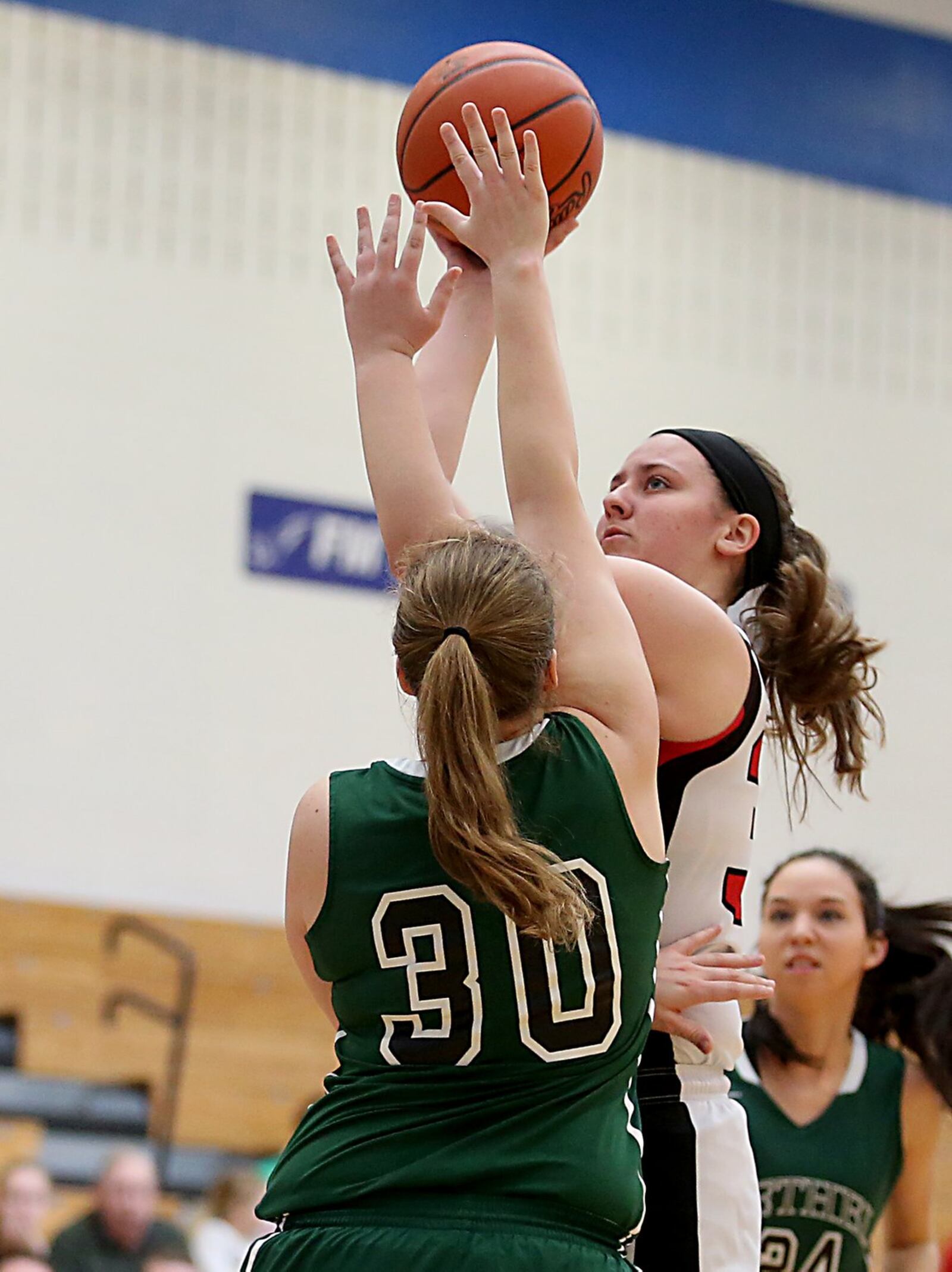 Madison forward Lauren Dietz eyes the basket as Bethel center Becky Schwieterman defends Saturday during a Division III sectional game at Franklin Monroe. CONTRIBUTED PHOTO BY E.L. HUBBARD