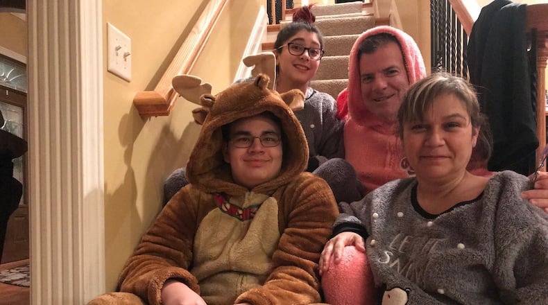 The Martin family in special pajamas. Front row: Max, Dulcie. Top: Emma and Chuck.