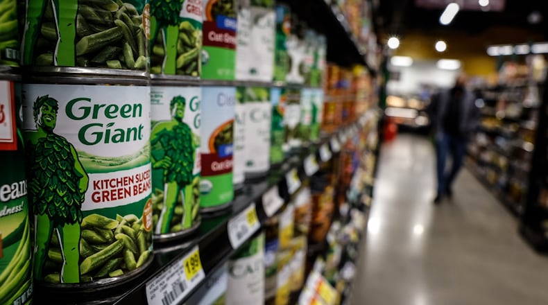 Food shelves at the Gem City Market on Salem Avenue are stocked Thursday February 9, 2023. JIM NOELKER/STAFF