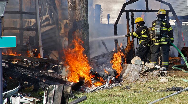 Two mobile homes were destroyed by a fire and five others were damaged Wednesday, Sept. 20, 2023, at the Honey Creek Mobile Home Park in Pike Township. Fire crews from six surrounding departments responded to the blaze. They arrived to find one mobile home fully involved and another partially involved. There were no injuries reported from the fire. BILL LACKEY/STAFF
