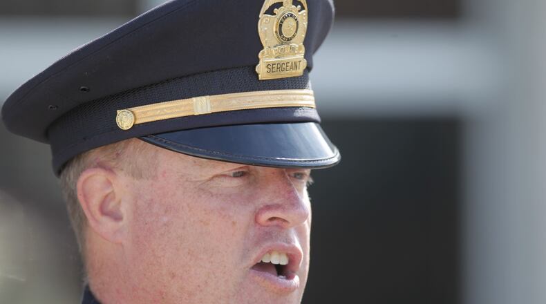 Dayton police Sgt. Gordon Cairns reminded the public to get a safe ride home if they plan on drinking for St. Patrick's Day. STAFF/JIM NOELKER