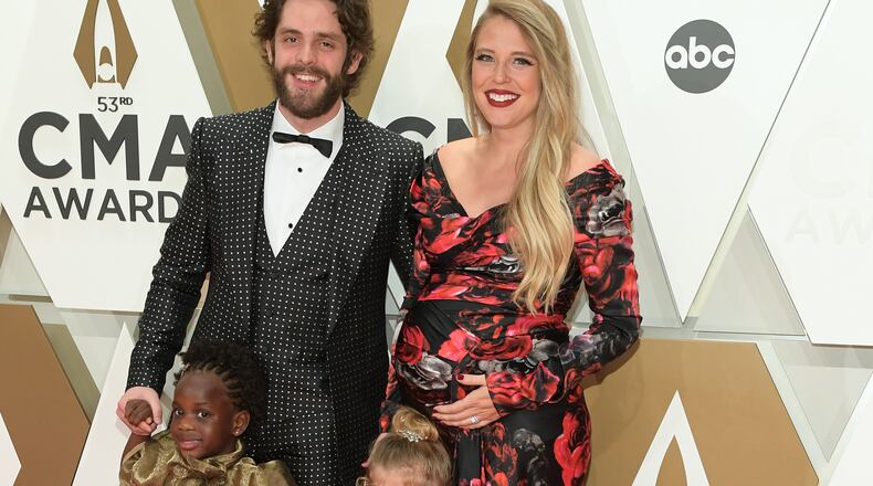 NASHVILLE, TENNESSEE - NOVEMBER 13: (FOR EDITORIAL USE ONLY) (L-R) Willa Gray Akins, Thomas Rhett, Ada James Akins and Lauren Akins attend the 53rd annual CMA Awards at the Music City Center on November 13, 2019 in Nashville, Tennessee. (Photo by Jason Kempin/Getty Images)