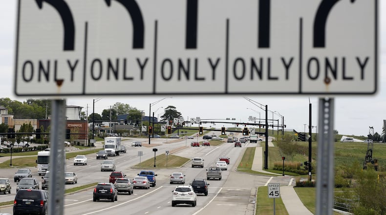 The speed limit on all public roads in Austin Landing has been lowered from 45 miles per hour to 25 mph as part of a series of safety measures sought by VisCap Development, which oversees the complex in Miami Twp. TY GREENLEES / STAFF