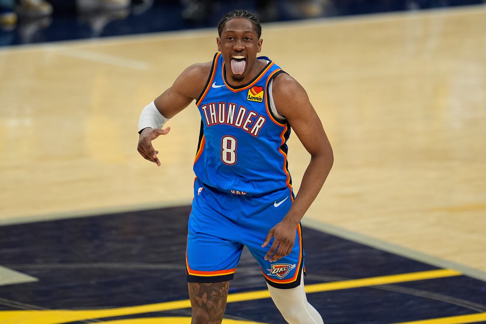 Oklahoma City Thunder forward Jalen Williams (8) motions after making a three pointer against the Indiana Pacers during the second half of Game 3 of the NBA Finals basketball series, Wednesday, June 11, 2025, in Indianapolis. (AP Photo/Abbie Parr)
