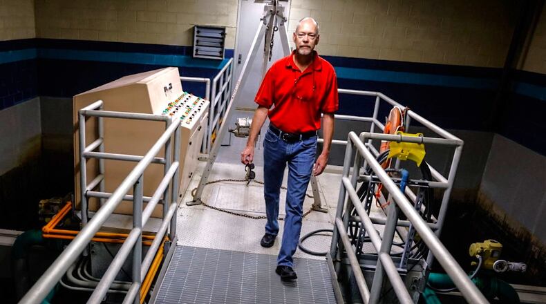West Carrollton service director Rich Norton walks in the sand filter room which will be apart of the $8.8 million upgrade to its water treatment plant. Jim Noelker/Staff