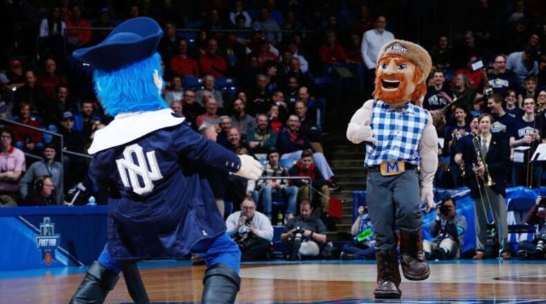 DAYTON, OH - MARCH 14: The Mount St. Mary's Mountaineers mascot and the New Orleans Privateers mascot perform during the First Four game in the 2017 NCAA Men's Basketball Tournament at UD Arena on March 14, 2017 in Dayton, Ohio. (Photo by Joe Robbins/Getty Images)