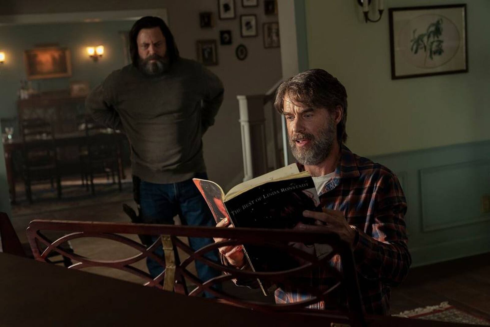 Frank (Murray Bartlett, right) and Bill (Nick Offerman) bond over the perfect Linda Ronstadt song in Episode 3 of "The Last of Us." (Liane Hentscher/HBO/TNS)