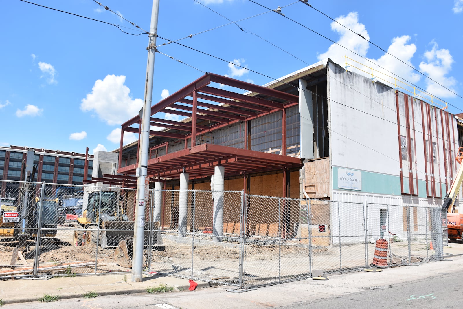 Woodard Development is renovating and adding onto a 30,000-square-foot warehouse at 435 E. Third St. in downtown Dayton. The building, which once belonged to KK Motorcycle Supply,  will become Class A office space. CORNELIUS FROLIK / STAFF