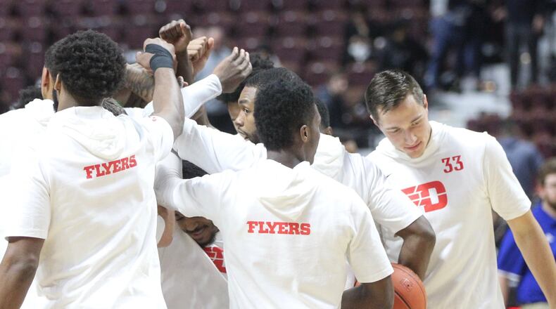 Dayton huddles before a game against Tulsa on Sunday, Dec. 16, 2018, at Mohegan Sun Arena in Uncasville, Conn. David Jablonski/Staff