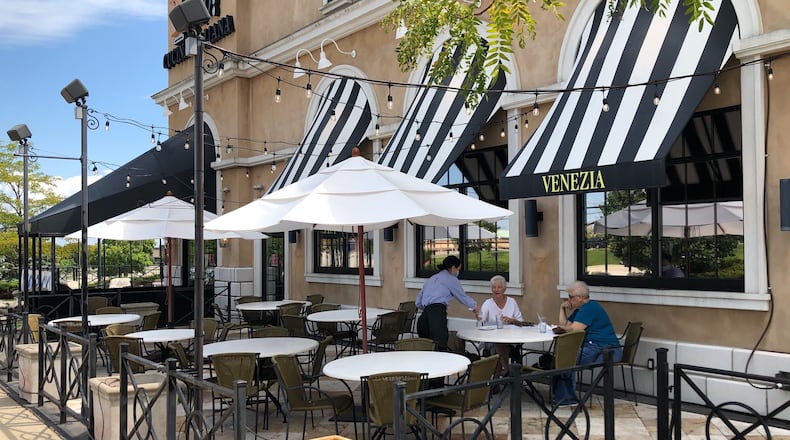 The new owner of Bravo and Brio Italian restaurant chains is touting patio dining and working to reopen the BRAVO! Cucina Italiana at the Mall at Fairfield Commons location after buying the chains out of bankruptcy. This is the patio at the Bravo restaurant in front of the Dayton Mall. MARK FISHER/STAFF