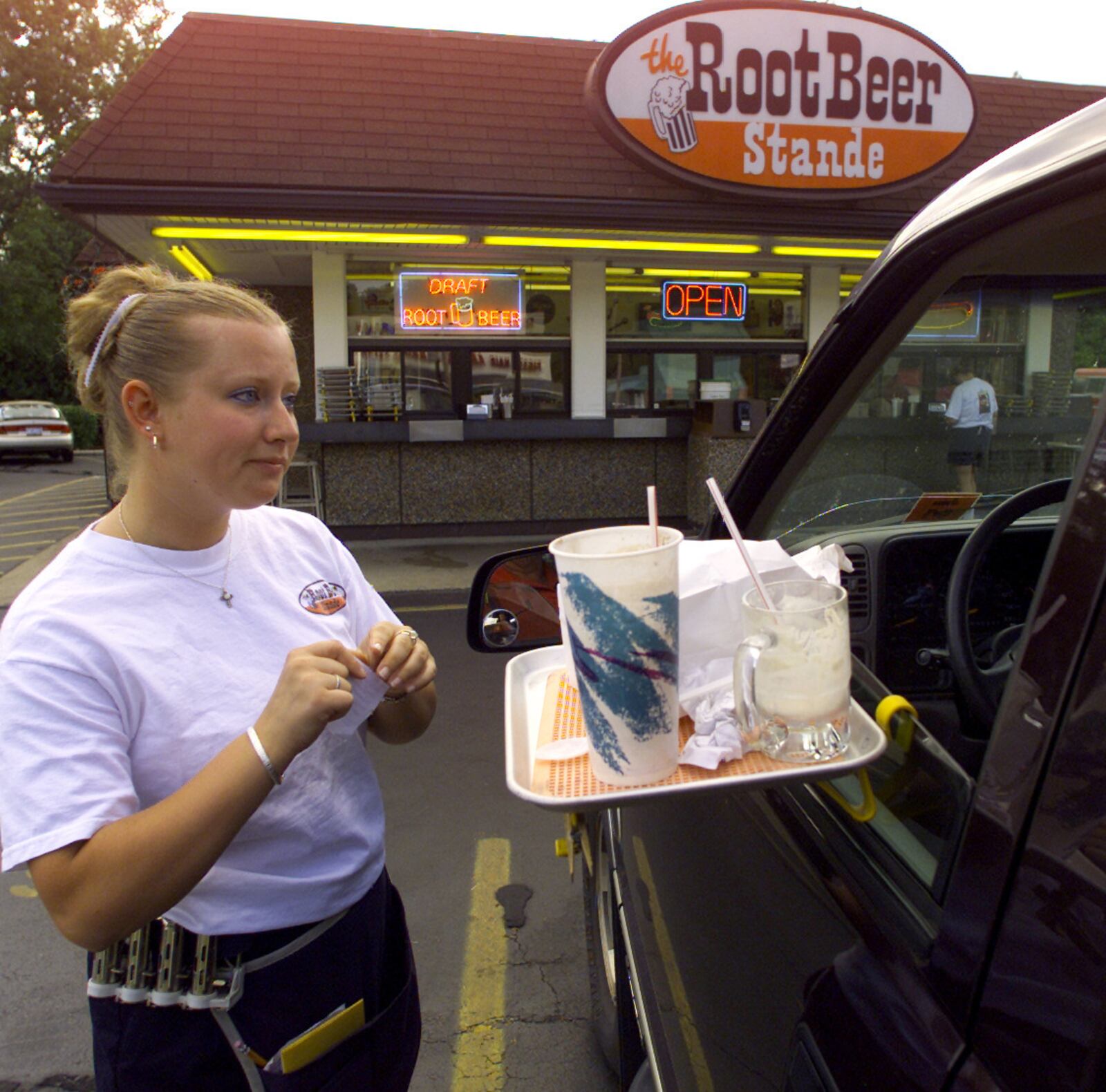 Meghan Moore, of Dayton, works at The Root Beer Stande, located on 2727 Woodman Drive in Dayton. For a Valley Portrait.