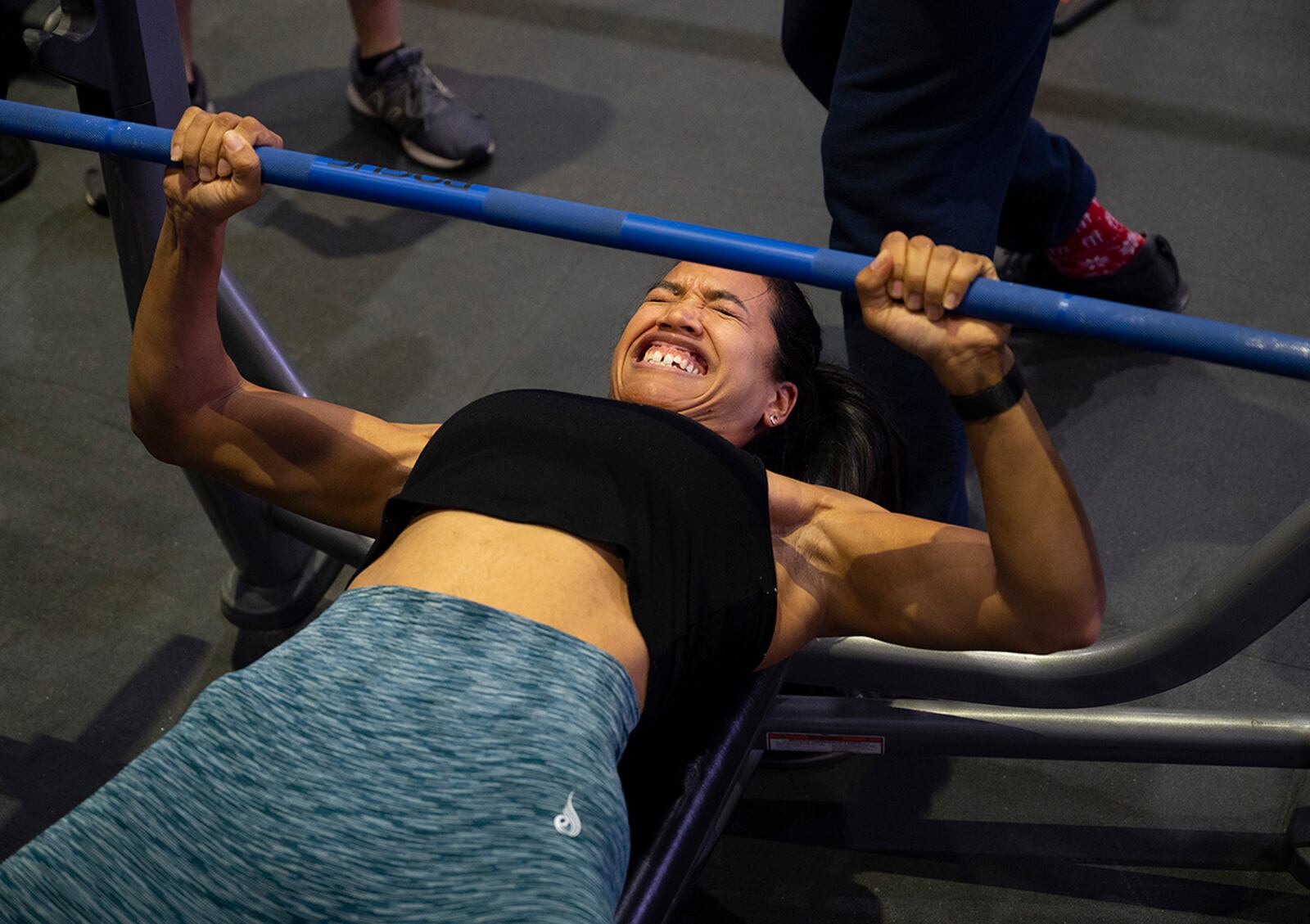 Shanika Tophia, 88th Medical Support Squadron, makes her first attempt in the bench-press portion of the powerlifting competition Dec. 11 at Wright Field Fitness Center. She powered her way to a second-place finish in the event. U.S. AIR FORCE PHOTO/R.J. ORIEZ