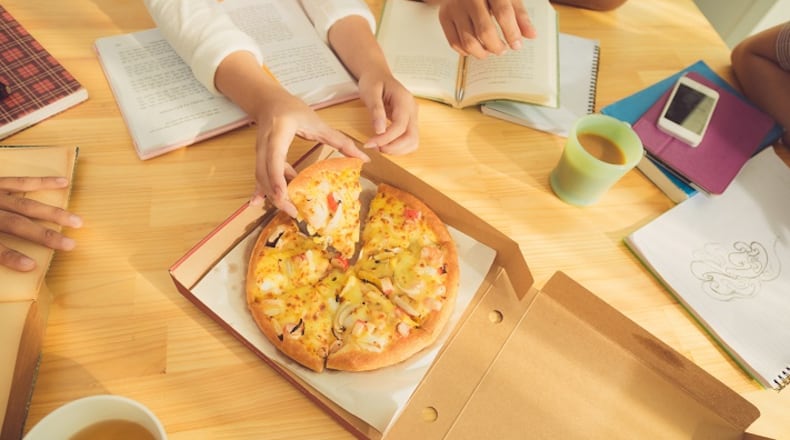 Leftover pizza would make a healthier breakfast than the boxed sugary cereals you grew up with. (Dreamstime)