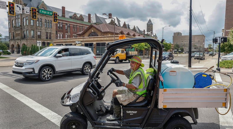 Richard Meeks, a City of Springfield seasonal worker, drives a vehicle on Wednesday, August 13, 2025, at Springfield City Hall Plaza. JOSEPH COOKE/STAFF