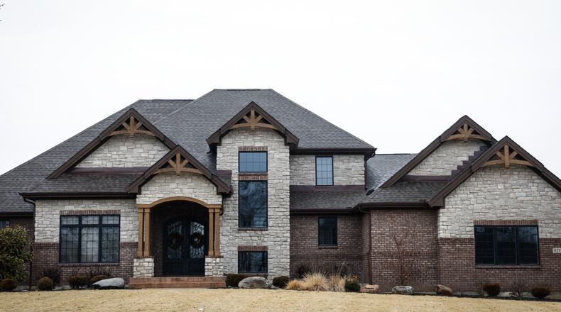 This 4-bedroom, 4-bathroom, 5,121-square-foot home in the 8200 block of Turning Leaf Crossing in Clearcreek Twp. sold for full price at $975,000 in just five days last year. The luxury home market in the Dayton area continues to soar and shows no sign of coming down. JIM NOELKER/STAFF