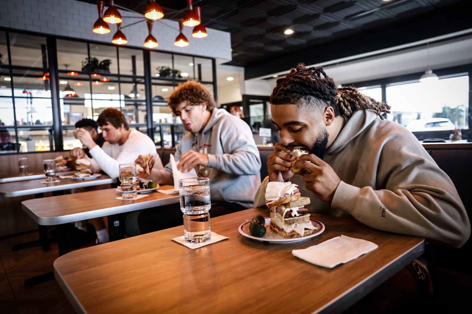 OSU players sandwich eating competition for charity