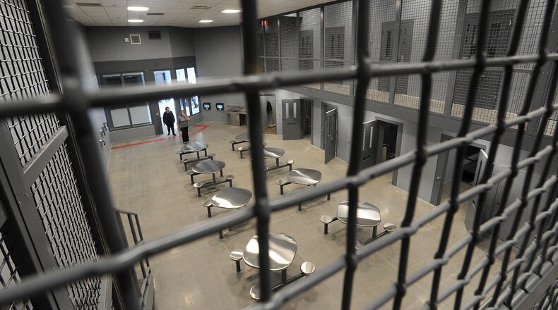 Christopher Bibbs Jr., who has an arm tattoo that says “only the strong survive,” was “incorrectly released” from the Warren County Jail on March 23, the Michigan Corrections Department said. This is a view of one of the pods at the Warren County Jail. FILE PHOTO