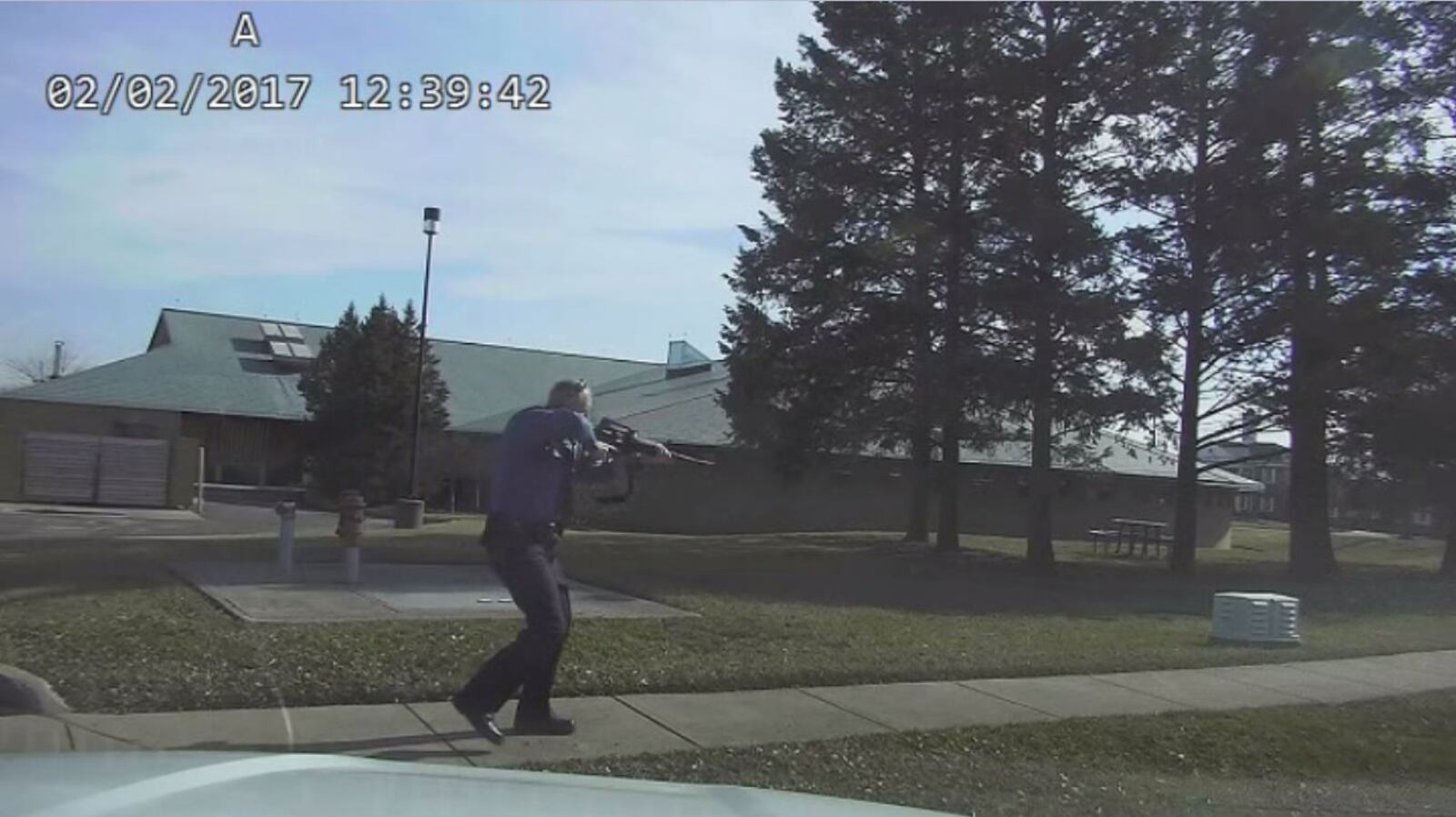 A Centerville police officer responds to the wounded teen in last week’s officer-involved shooting. CONTRIBUTED