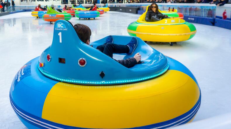 Ice bumper cars similar to these pictured at New York's Winter Village ice skating rink at Bryant Park will be part of the winter fun at Cincinnati's Fountain Square Ice Rink this season.
