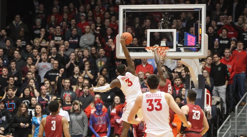 Dayton's Trey Landers dunks against Saint Joseph's on Tuesday, Jan. 29, 2019, at UD Arena.