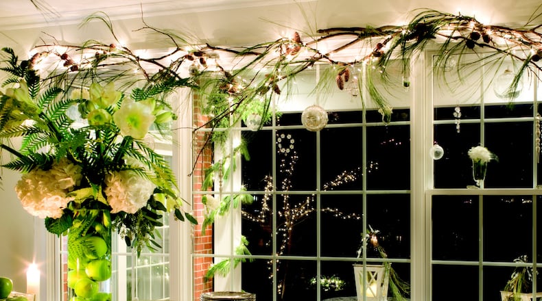 Amazing greenery and show-stealing ribbon are the essential bedrocks of a sensational holiday treatment. (Mary Carol Garrity/TNS)