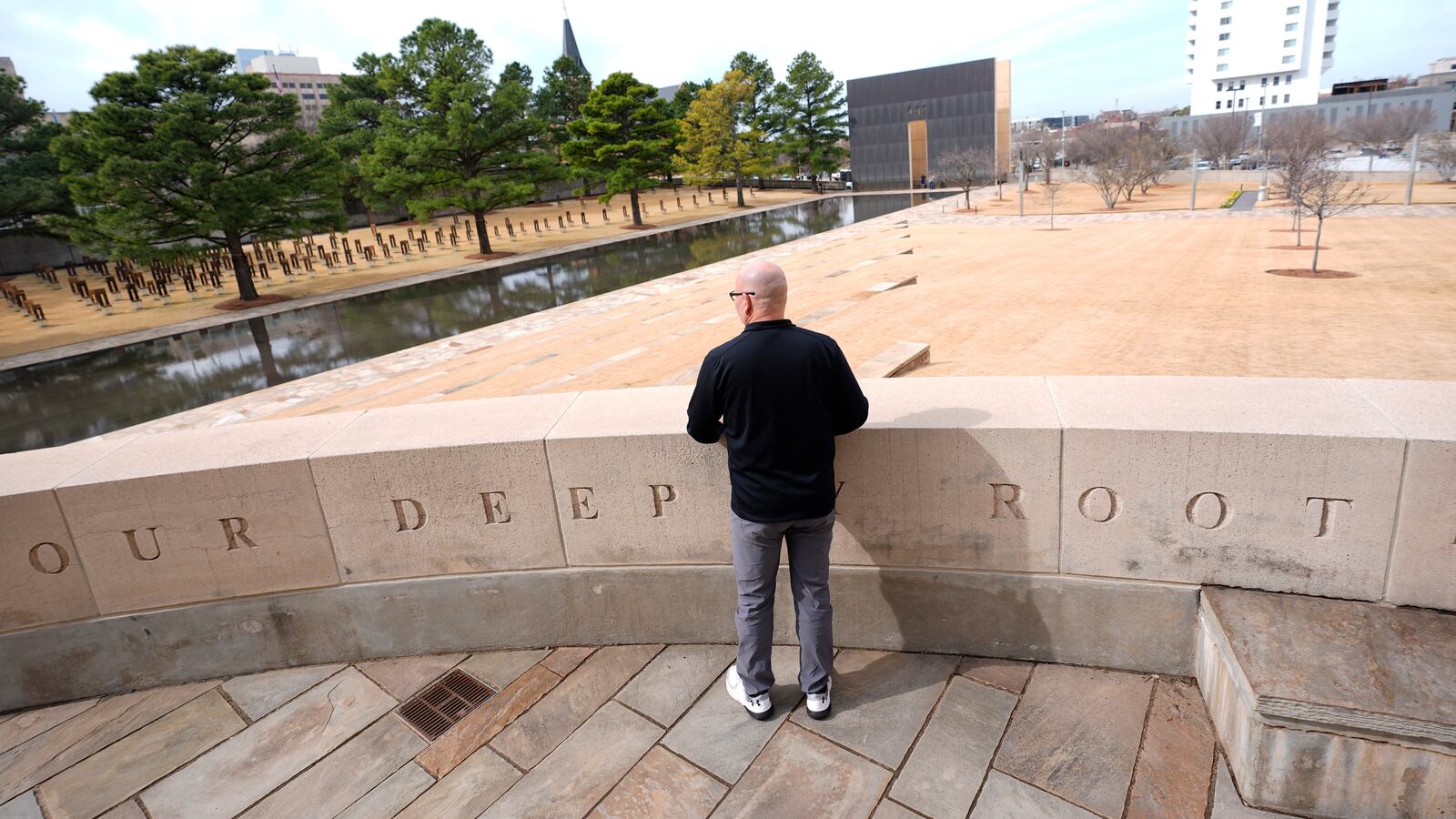 Former Oklahoma City firefighter Chris Fields looks at the Oklahoma City National Memorial in Oklahoma City on March 12, 2025. (AP Photo/LM Otero)