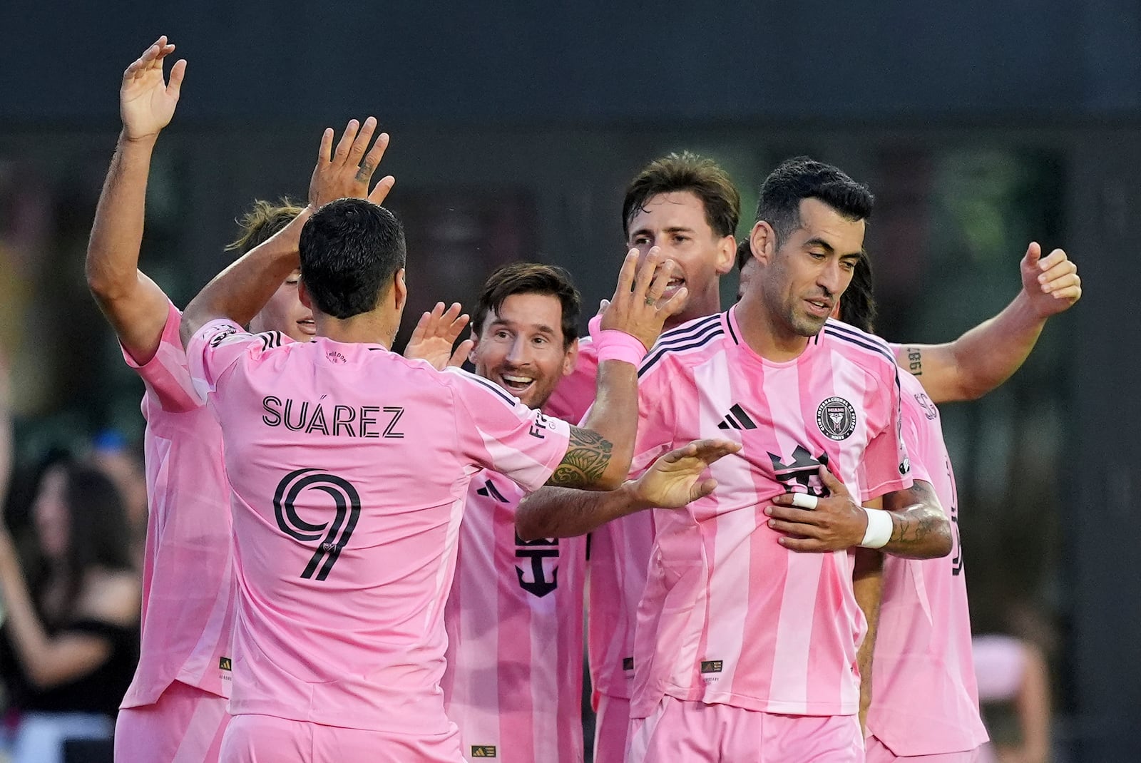 Teammates celebrate with Inter Miami forward Lionel Messi, center, after he scored the side's second goal against Columbus Crew during the first half of an MLS soccer match, Saturday, May 31, 2025, in Fort Lauderdale, Fla. (AP Photo/Rebecca Blackwell)