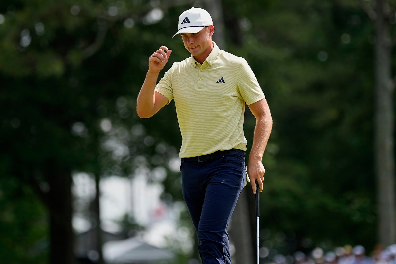 Ludvig Åberg, of Sweden, waves after making a putt on the ninth hole during the first round of the PGA Championship golf tournament at the Quail Hollow Club, Thursday, May 15, 2025, in Charlotte, N.C. (AP Photo/George Walker IV)