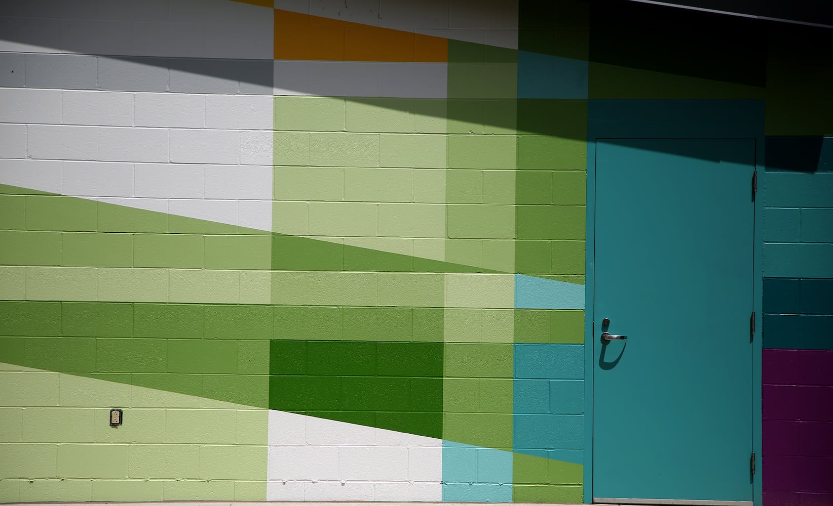 PHOTOS: The completed Levitt Pavilion mural is a combination of shape, color and poetry