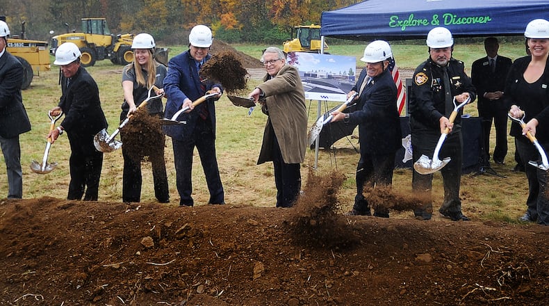 Ohio Governor Mike DeWine, center, along with Greene County leaders broke ground Friday, Oct. 27, 2023 for the new Greene County Gene Fischer Correctional Center. MARSHALL GORBY\STAFF