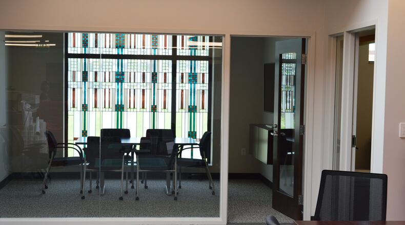 Several conference rooms throughout the new municipal building provide well-lit comfortable settings but this one adds some color, as well, utilizing a window left from when the building was the Lane Public Library. CONTRIBUTED/BOB RATTERMAN