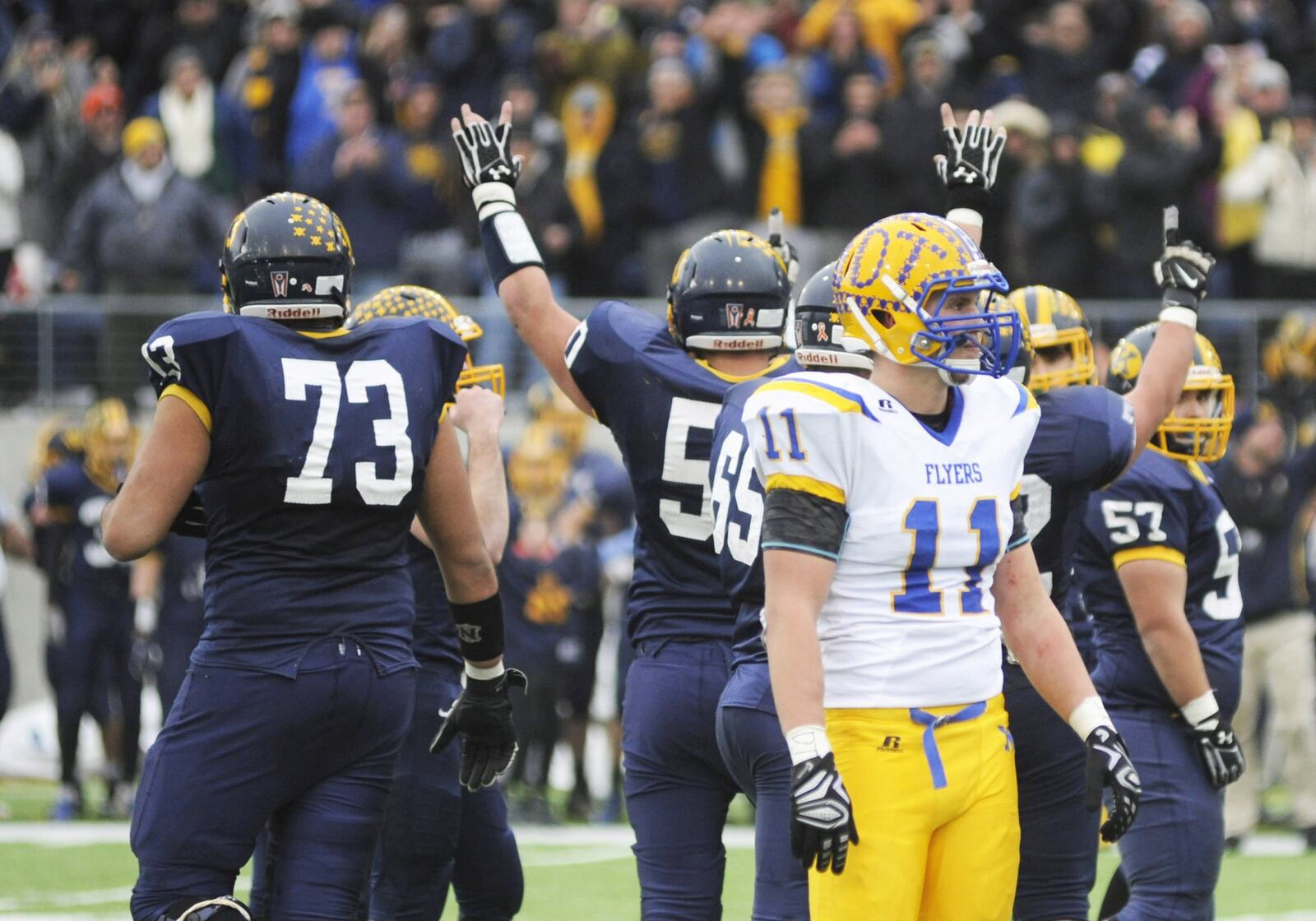 Marion Local’s Sam Huelsman (11) can only watch as Kirtland begins to celebrate. Kirtland defeated Marion Local 16-7 in the D-VI high school football state championship at Canton’s Tom Benson Hall of Fame Stadium on Friday, Nov. 30, 2018. MARC PENDLETON / STAFF
