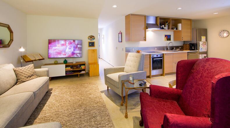 Architect/homeowner Andrew van Leeuwen s mother-in-law, Helen, moved into this lower-level ADU, filled with activities to encourage intergenerational interaction, from Spokane. I see how simple it is to live in that downstairs space, he says. (Mike Siegel/Seattle Times/TNS)