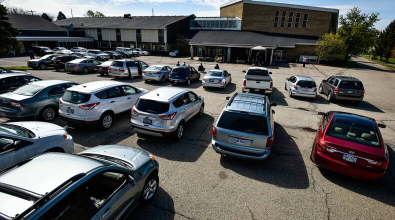 New Life Vineyard Church held a drive-in Easter service Sunday, April 12, 2020 on Princeton Road in Fairfield Township. The church has been doing online services but chose to try a drive-in service for Easter to bring people together while still maintaining a safe social distance. NICK GRAHAM / STAFF