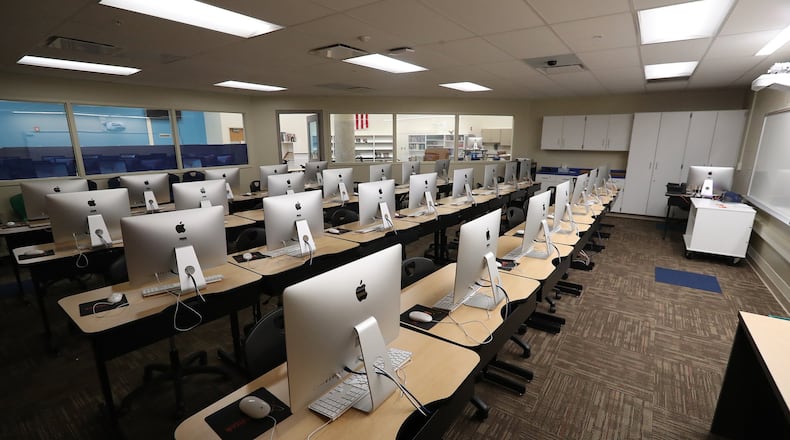 Students take state exams online, but social distancing issues will be added to the usual technological concerns this year. BILL LACKEY/STAFF