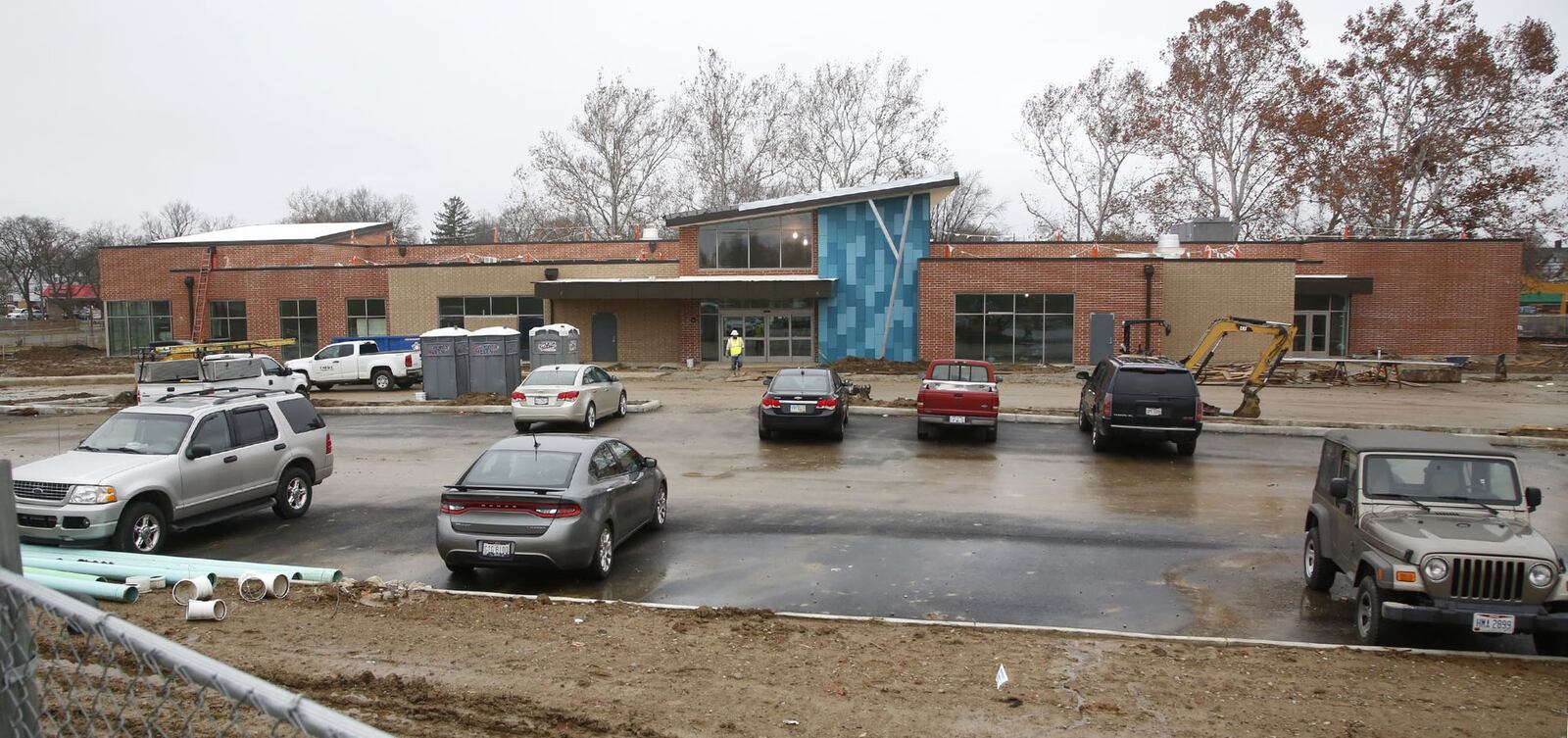 The Belmont Branch of the Dayton Metro Library is under roof and workers are building and finishing the inside of the new structure at Wayne and Waterveliet Ave. This branch and the new Stroop branch are expected to open in July of 2019. TY GREENLEES / STAFF