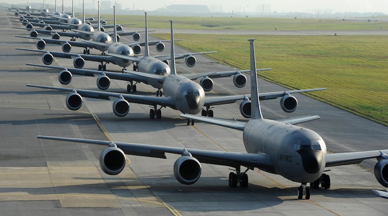 Twelve KC-135 Stratotankers from the 909th Air Refueling Squadron taxi onto the runway on Kadena Air Base, Japan, April 1, 2015. To hear how Air Force Life Cycle Management Center is keeping legacy tankers in the air, you can watch Leadership Log on YouTube at https://youtu.be/uZy1qLIEYz0. You can also listen by searching “Leadership Log” on Apple Podcast, Google Podcast, Spotify, Overcast, Radio Public or Breaker. U.S. AIR FORCE PHOTO/STAFF SGT. MARCUS MORRIS