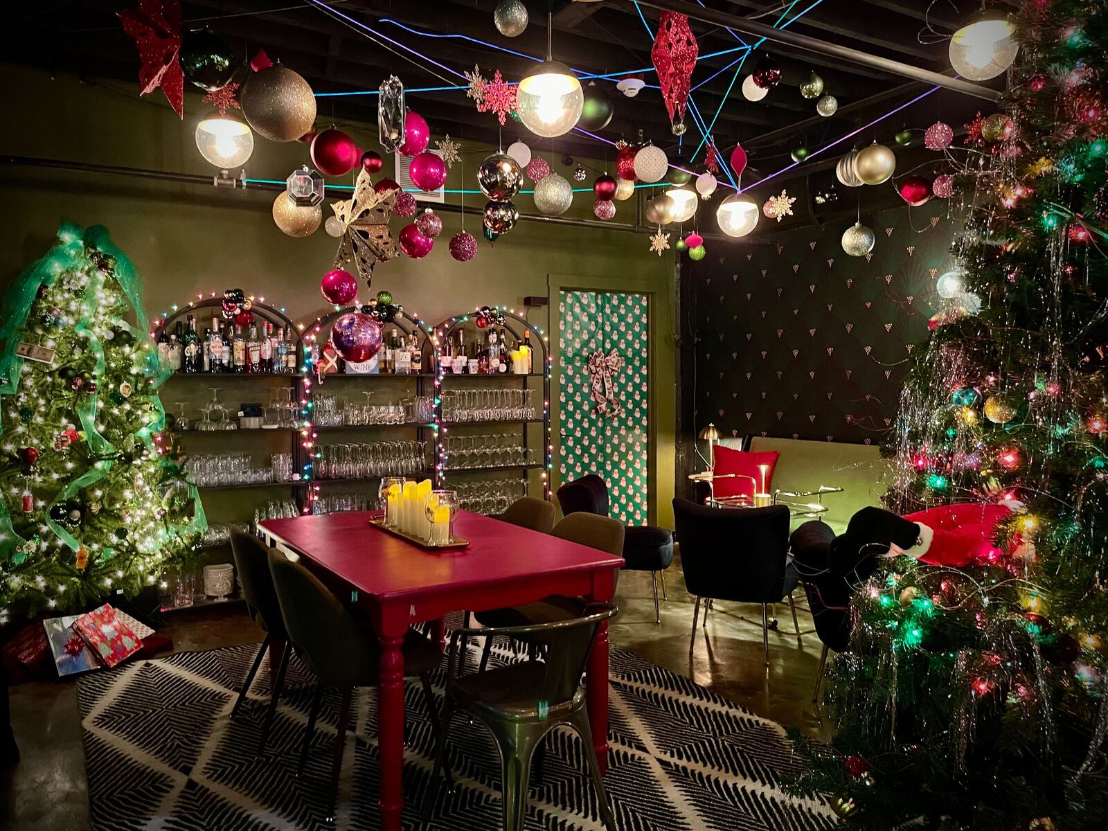 The cocktail lounge in the basement of Cherry Street Bottle Shop in Troy will be transformed into a Christmas pop-up bar this holiday season. “Cheer on Cherry Street” will be open Thursdays, Fridays and Saturdays from Nov. 29 through Dec. 28. NATALIE JONES/STAFF