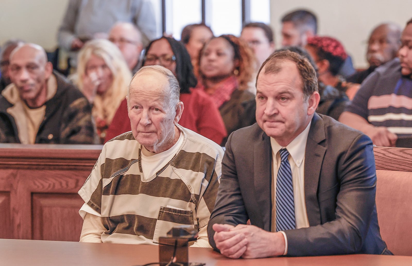 William Brock, left, and his defendant attorney Jon Paul Rion listen as a judge speaks at Brock's sentencing at the Clark County Common Pleas Court on Friday, Jan. 30, 2025, in Springfield. The 83-year-old was convicted of shooting Hall, a 61-year-old Uber driver, in March 2024 because he reportedly believed she was trying to rob him after scammers deceived them. JOSEPH COOKE/STAFF