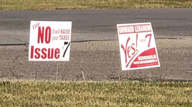 Campaign signs for and against the Lebanon school levy dot the community in fall 2019.