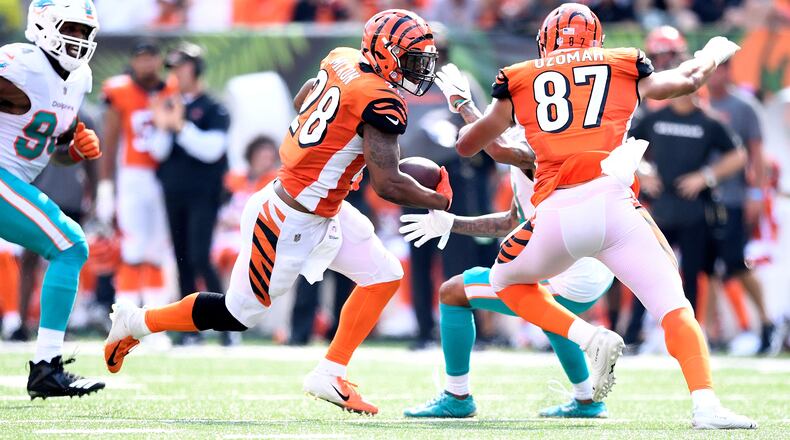 CINCINNATI, OH - OCTOBER 7: Joe Mixon #28 of the Cincinnati Bengals runs the ball up field during the third quarter of the game against the Miami Dolphins at Paul Brown Stadium on October 7, 2018 in Cincinnati, Ohio. (Photo by Bobby Ellis/Getty Images)