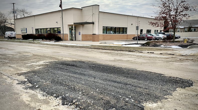 Forrer Boulevard in Kettering has reopened Jan. 27, 2022 after a water main break caused a portion of the road to shut down the night before. MARSHALL GORBY / STAFF