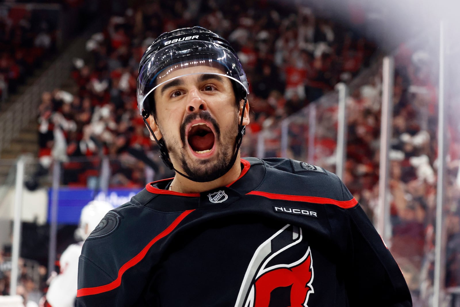 Carolina Hurricanes' Seth Jarvis celebrates after his goal against the Washington Capitals during the second period of Game 4 of a second-round NHL hockey playoff series in Raleigh, N.C., Monday, May 12, 2025. (AP Photo/Karl DeBlaker)