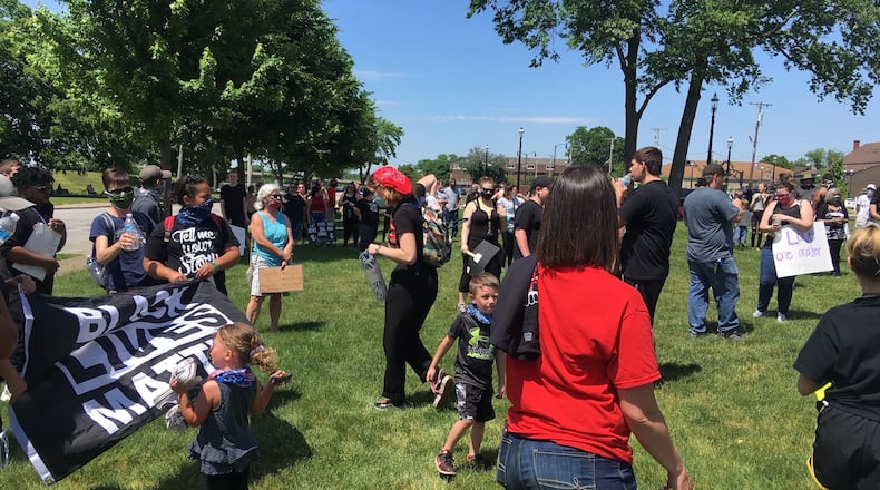 About 100 people gather at the stage in Riverfront Park / Credit: Timothy Gaffney