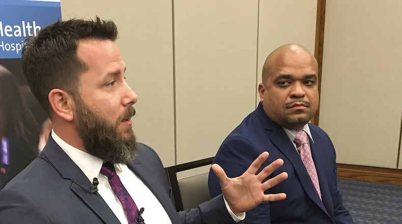 Joshua Granada, left, and Carlos Tavarez were the first two paramedics to arrive at the 2016 Pulse Night Club mass shooting in Orlando, Fla. They spoke Friday, May 18, 2018, in Dayton on the day of a mass shooting at a Texas school. CHRIS STEWART / STAFF