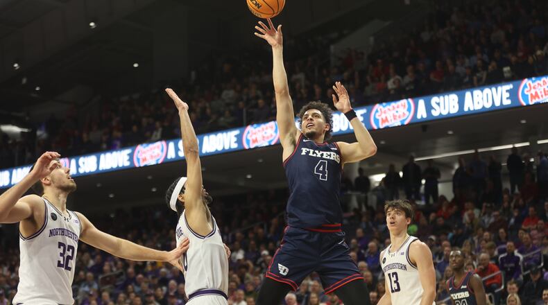 Dayton's Koby Brea scores against Northwestern on Friday, Nov. 10, 2023, at Welsh-Ryan Arena in Evanston, Ill. David Jablonski/Staff