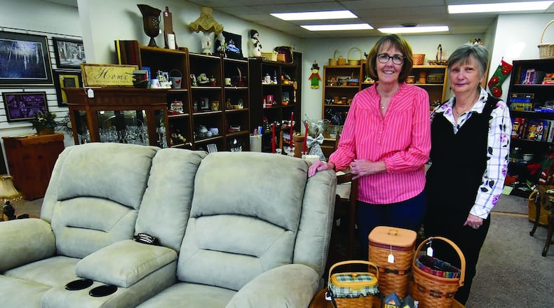 Karen Wright (left) and Kitty Saunders are the managers of The Gleaning Place, a volunteer-driven thrift store specializing in gently used home goods. The proceeds support community outreach efforts of The New Path Inc. Contributed