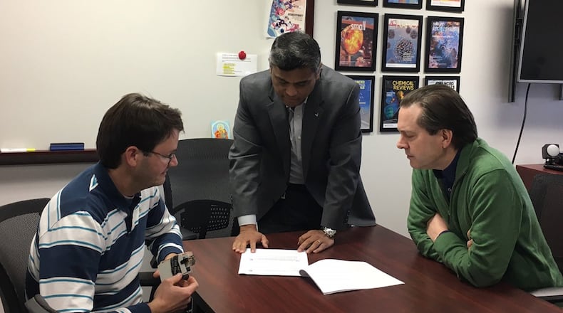 Left to right: Drs. Joseph M. Slocik, Rajesh R. Naik and Patrick B. Dennis of the Air Force Research Laboratory’s 711th Human Performance Wing and Materials and Manufacturing Directorate at Wright-Patterson Air Force Base were recently granted a patent on a method for stabilizing biological materials such as vaccines, antibodies, anti-venoms and antibiotics without using refrigeration. (Courtesy photo)
