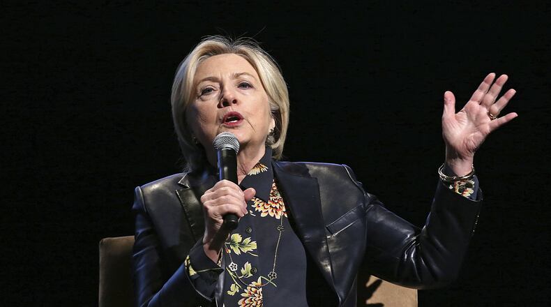 FILE - In this Dec. 15, 2017 file photo, former Secretary of State and presidential candidate Hillary Clinton speaks to the GirlsBuildLA Leadership Summit in Los Angeles. Clinton will speak at this year’s Class Day at Yale University. Class Day is an annual event at the New Haven, Connecticut, university that honors achievements in academic, artistic and athletic fields. Past notable speakers include former Secretary of State John Kerry and former Vice President Joe Biden in 2015. In a statement Monday, Feb. 26, 2018, Class Day co-chair and Yale student Josh Hochman says students should emulate Clinton’s “life of resilient and courageous service.” (AP Photo/Reed Saxon)